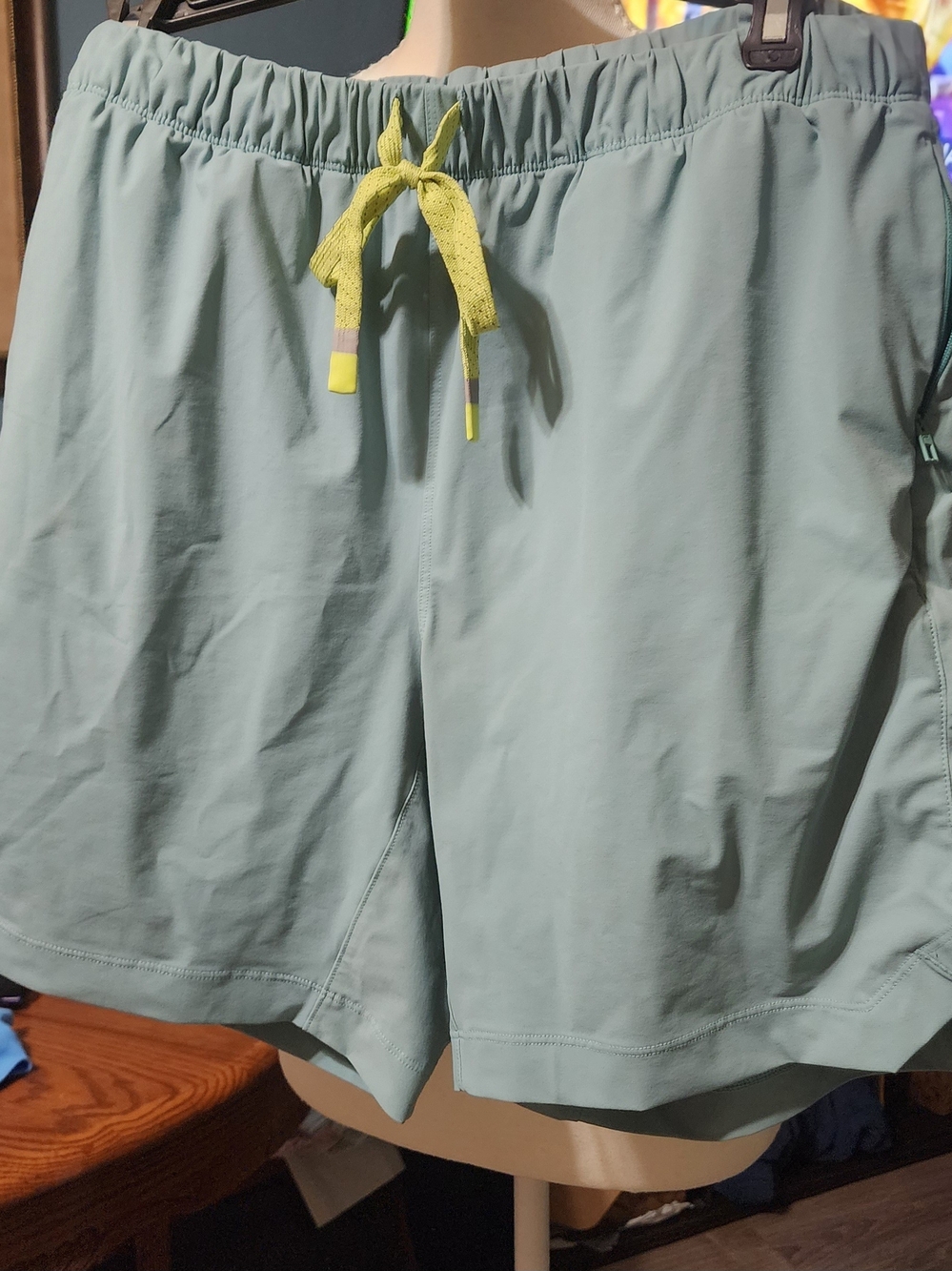 Fabletics Light Mint Athletic Shorts with Neon Yellow Drawstring